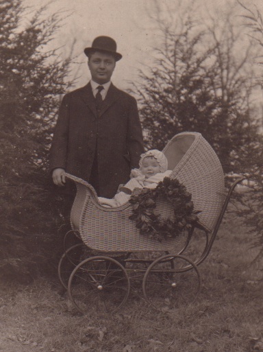 Unidentified man and baby